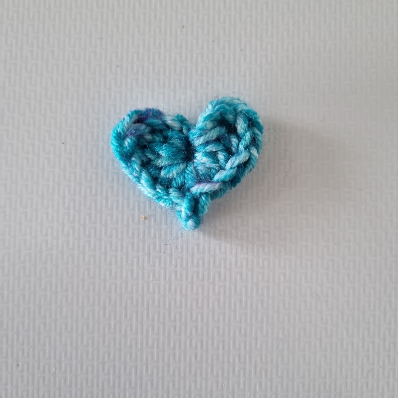 small blue crochet heart