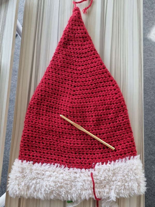 unfolded crochet santa hat
