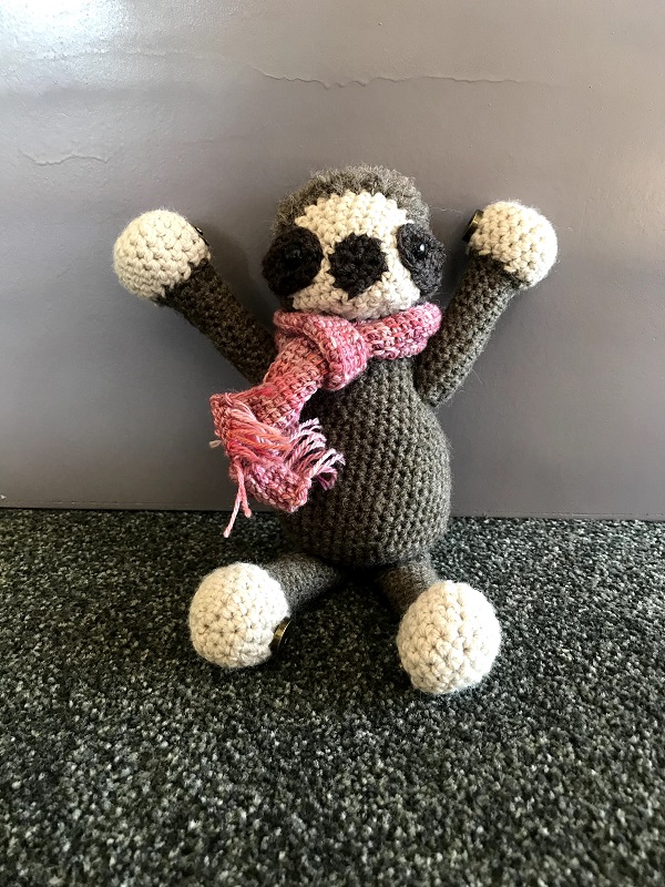 sloth with crocheted eyes