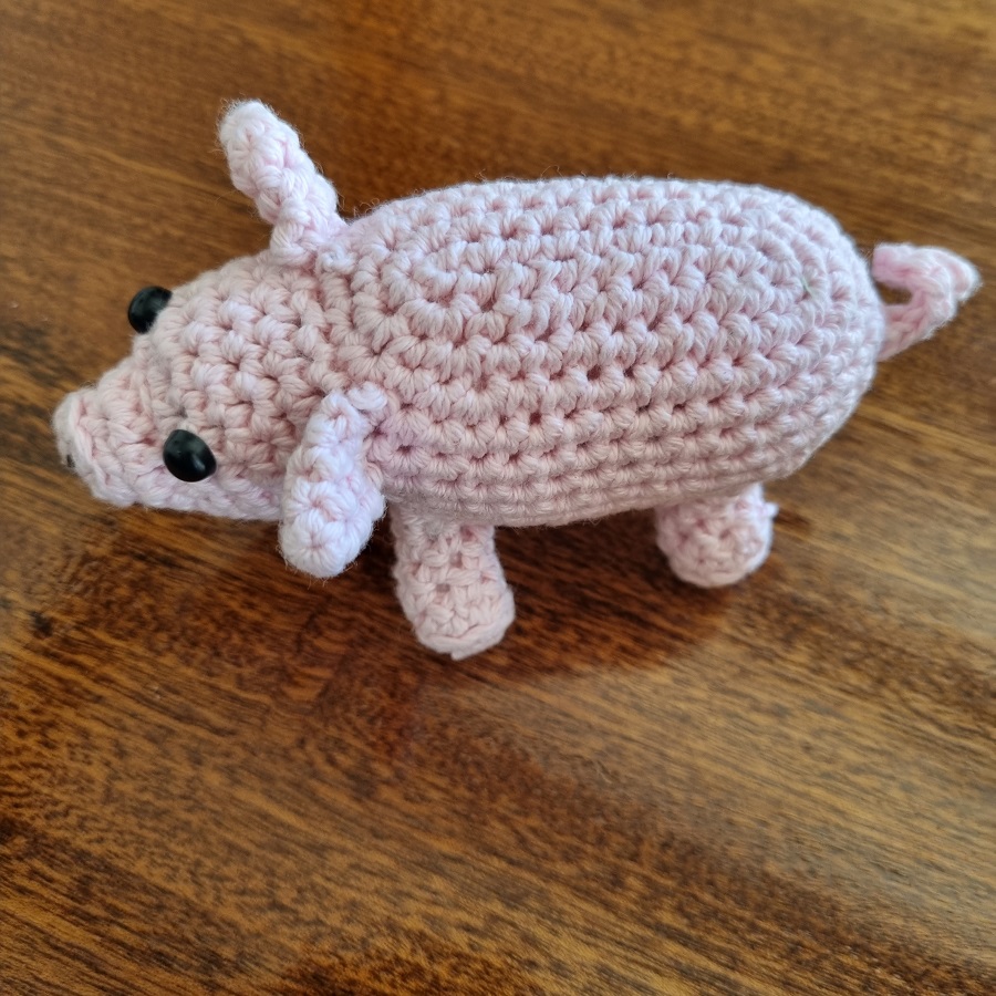 crochet pig on the side
